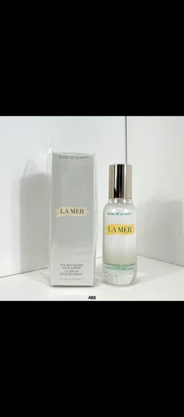 La Mer The Power of Aesthetic Beauty bottle and its white packaging box, displayed on a white surface against a white background.