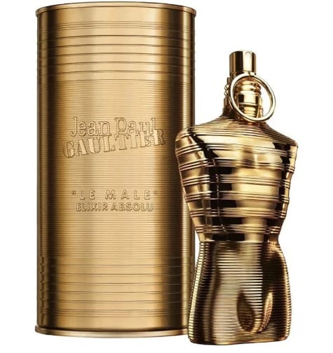 Jean Paul Gaultier Le Male Elixir Absolu perfume bottle and its signature cylindrical packaging box, both in a metallic gold finish, set against a plain white background.